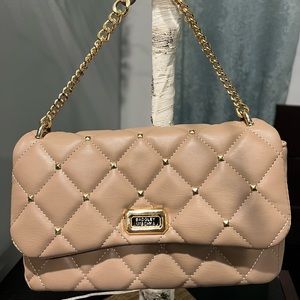 Bagdley Mishka Corssbody or Evening carry.   Brand new.  Darker nude color